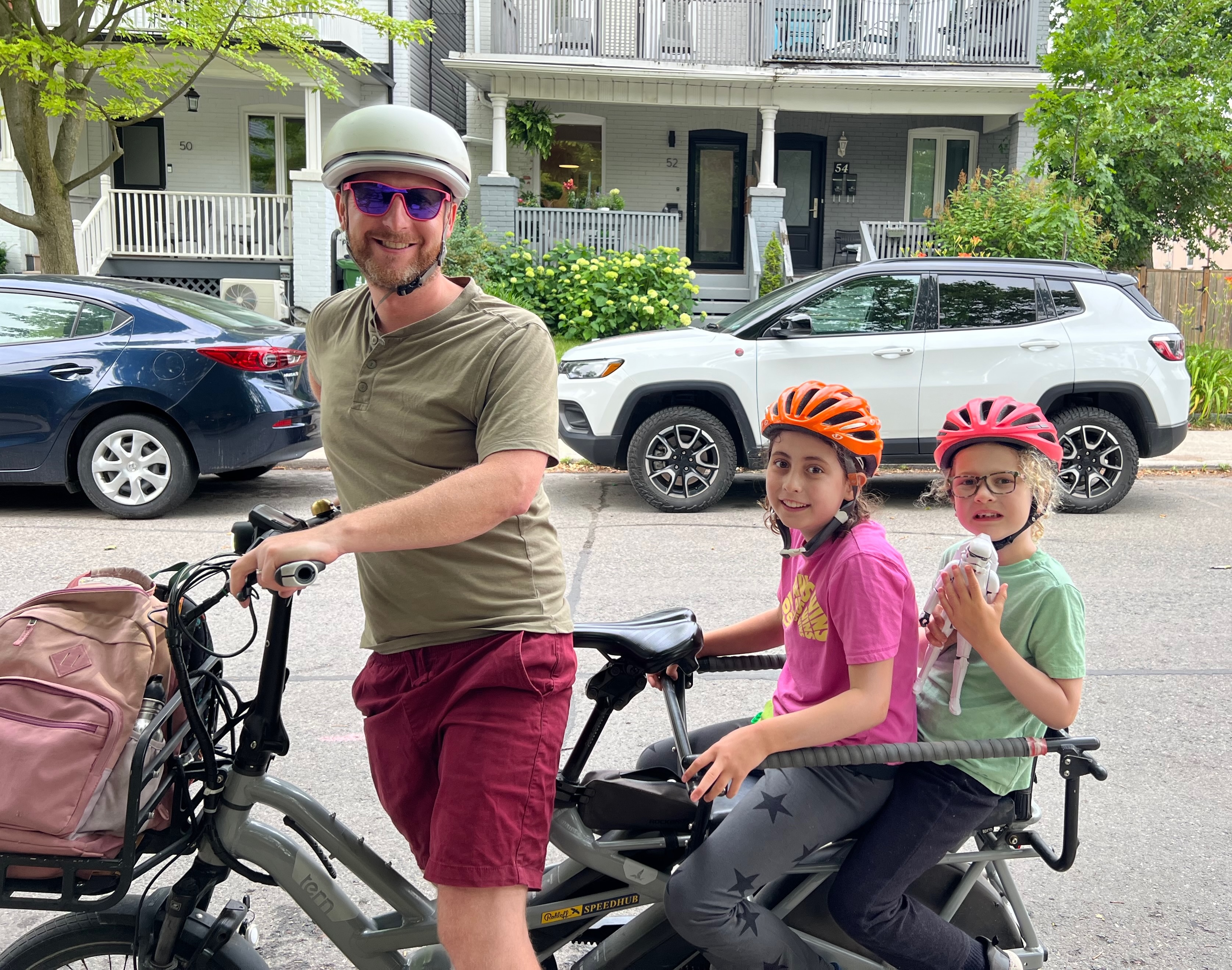 Greg and his two kids on a cargo bike in Toronto
